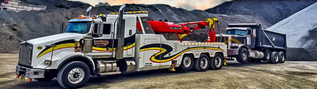 Tumino's Towing company banner
