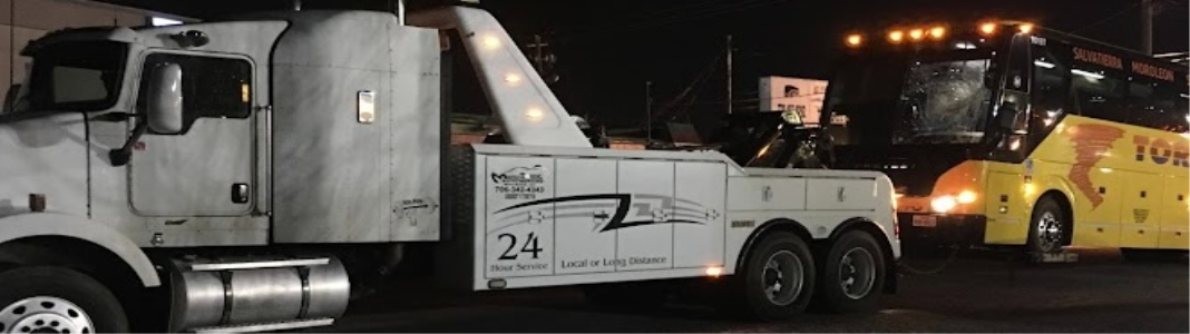 Maurice's Towing company banner