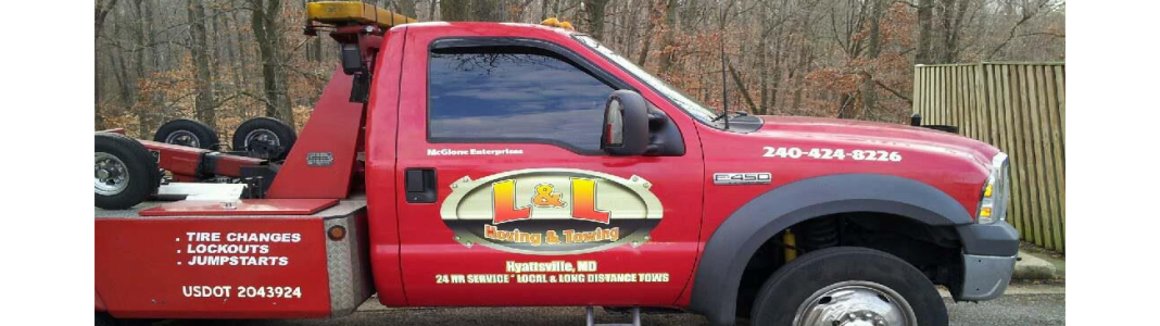 LL Towing company banner
