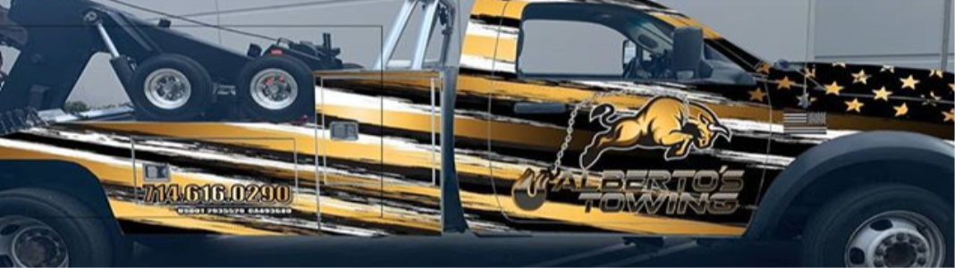 Alberto's Towing company banner