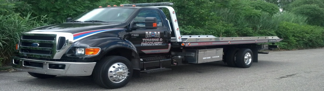 M&M Towing & Truck Repair company banner