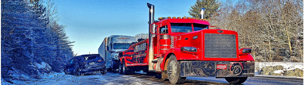 Leonard Heavy Duty Towing company banner
