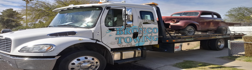 Bronco Towing company banner