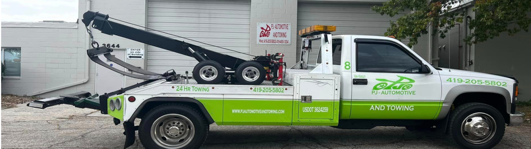 PJ Automotive and Towing company banner