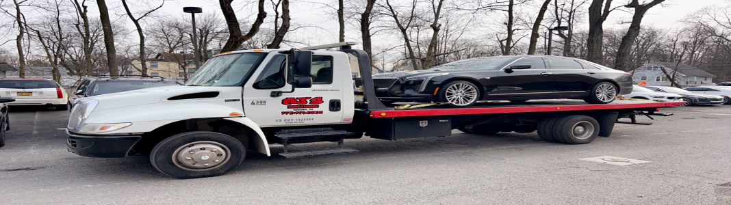 Aj's Towing & Recovery company banner