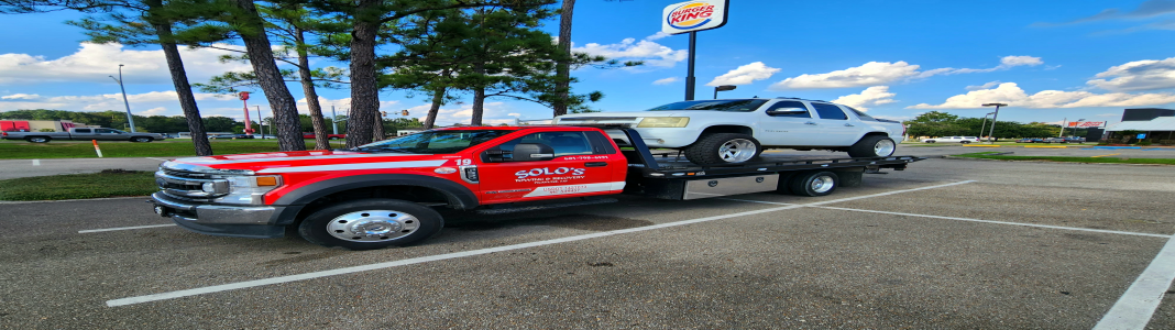Solo's Towing company banner