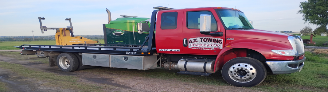 A.T. Towing company banner
