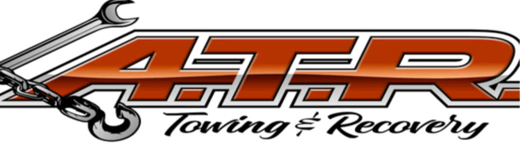 ATR Towing and Recovery         /       Carl's Towing company banner