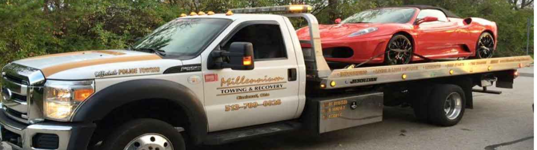 Millennium Towing company banner