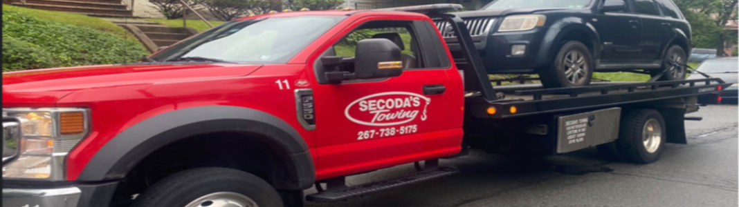 SECODA'S TOWING SERVICE company banner