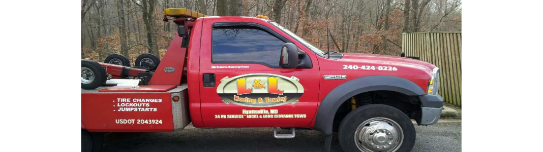 LL Towing company banner